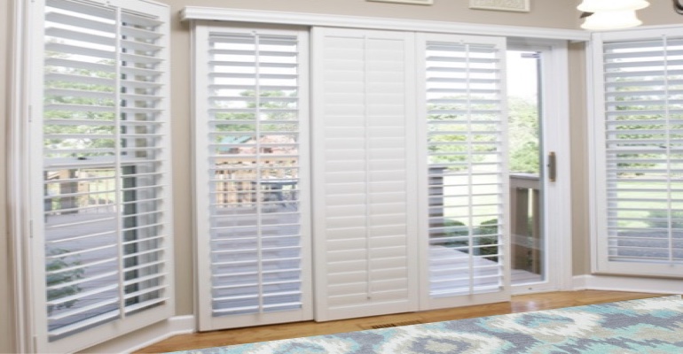 [Polywood|Plantation|Interior ]211] shutters on a sliding glass door in Houston